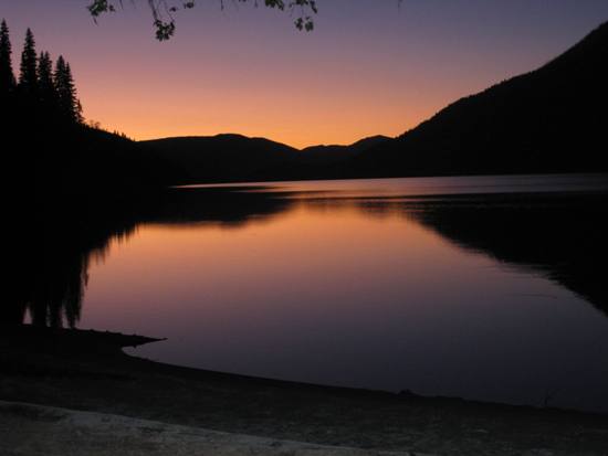 Canoe Tour Bowron Lakes sunset over lake